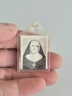 Pocket relic piece of the garment of Mother Marie-Léonie